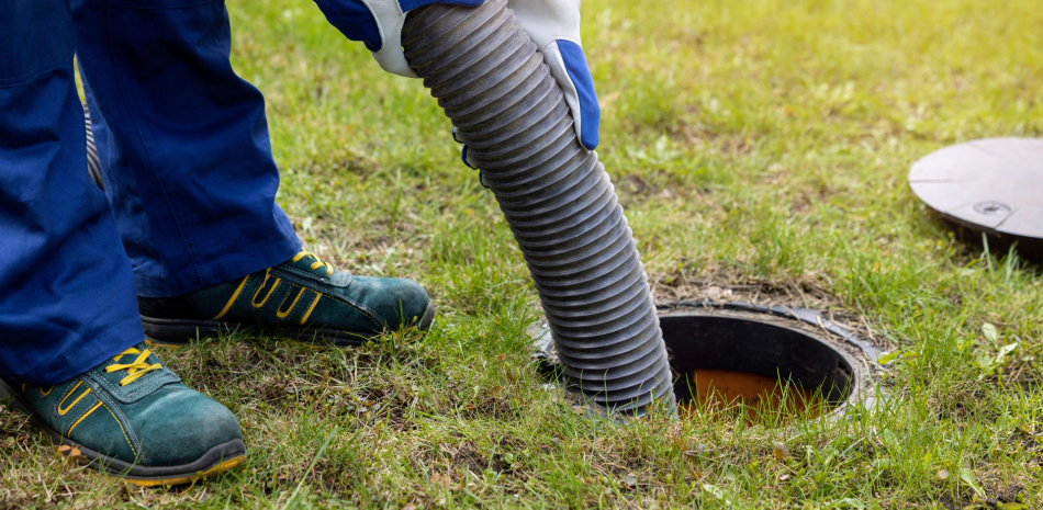 Drain cleaning wearing ppe